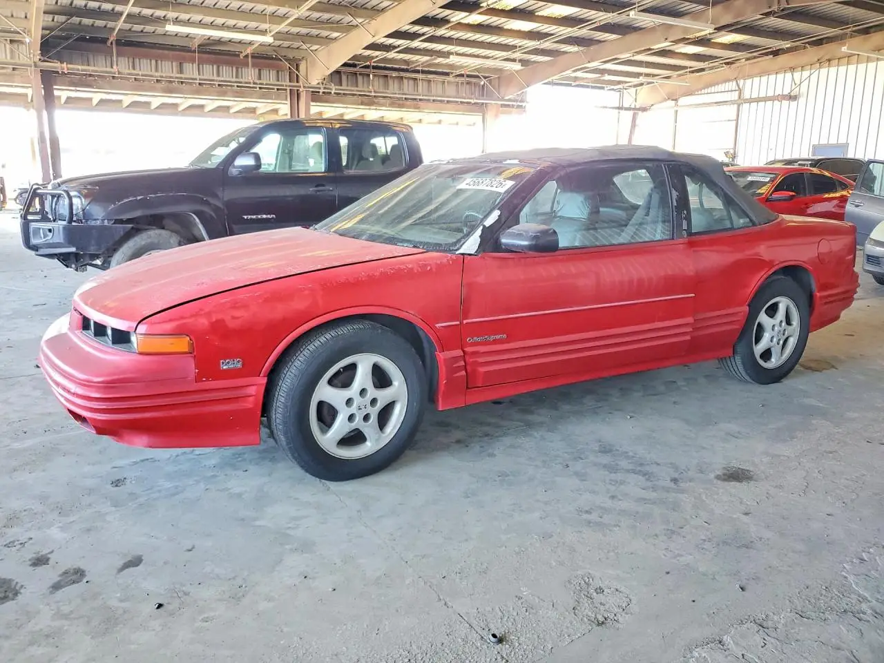 1993 OLDSMOBILE CUTLASS RED VIN: 1G3WT34X1PD319517