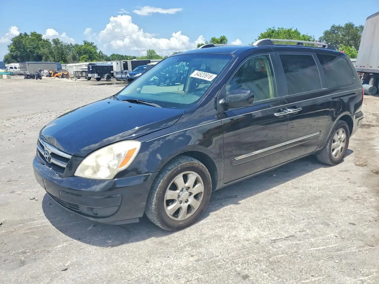 2007 HYUNDAI ENTOURAGE BLACK VIN: KNDMC233X76037641