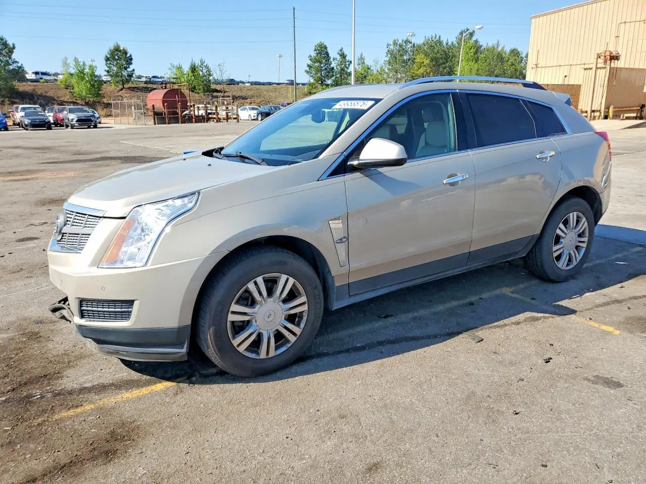 2011 CADILLAC SRX GOLD VIN: 3GYFNAEY7BS644777