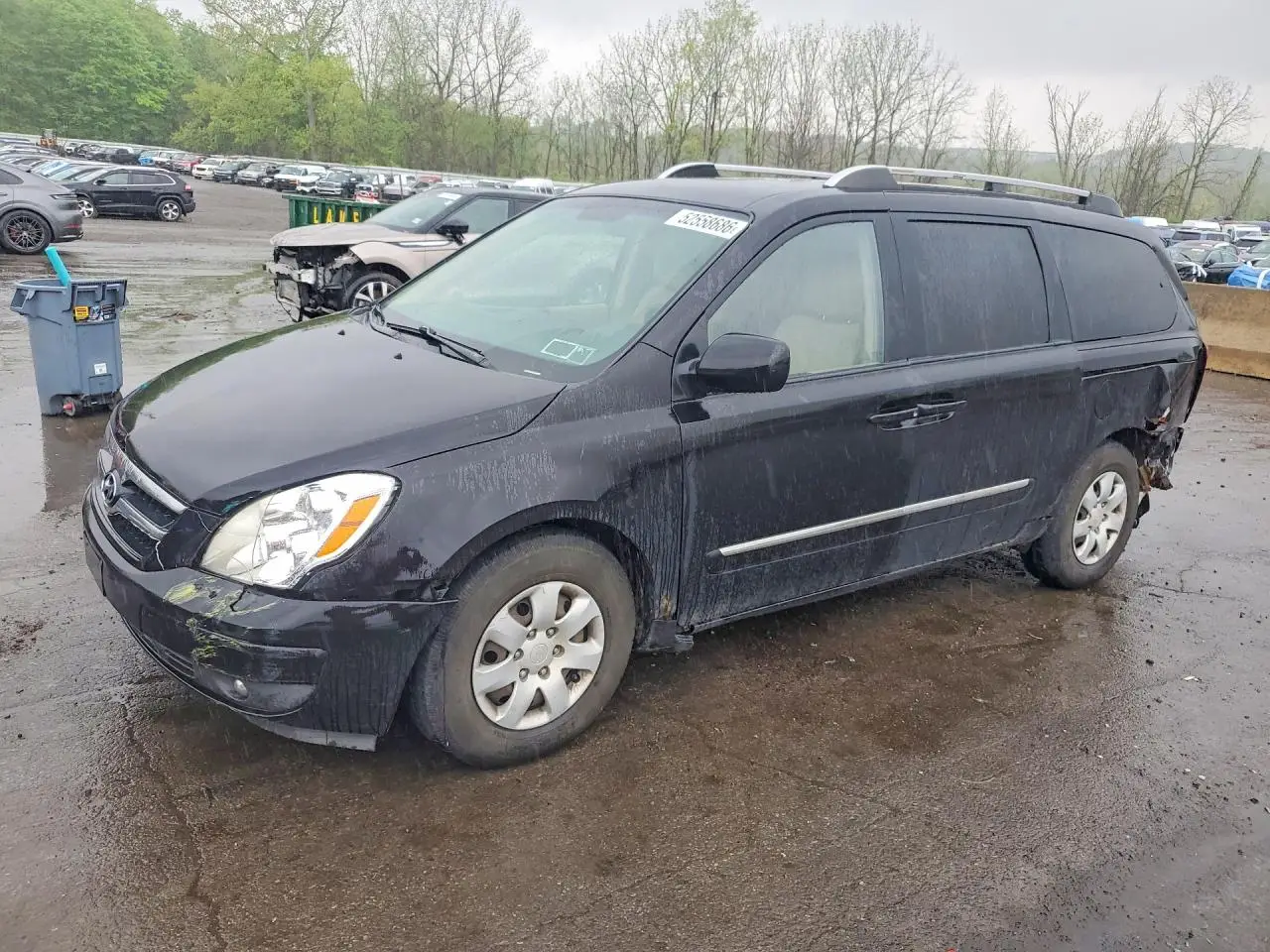 2007 HYUNDAI ENTOURAGE BLACK VIN: KNDMC233776013216