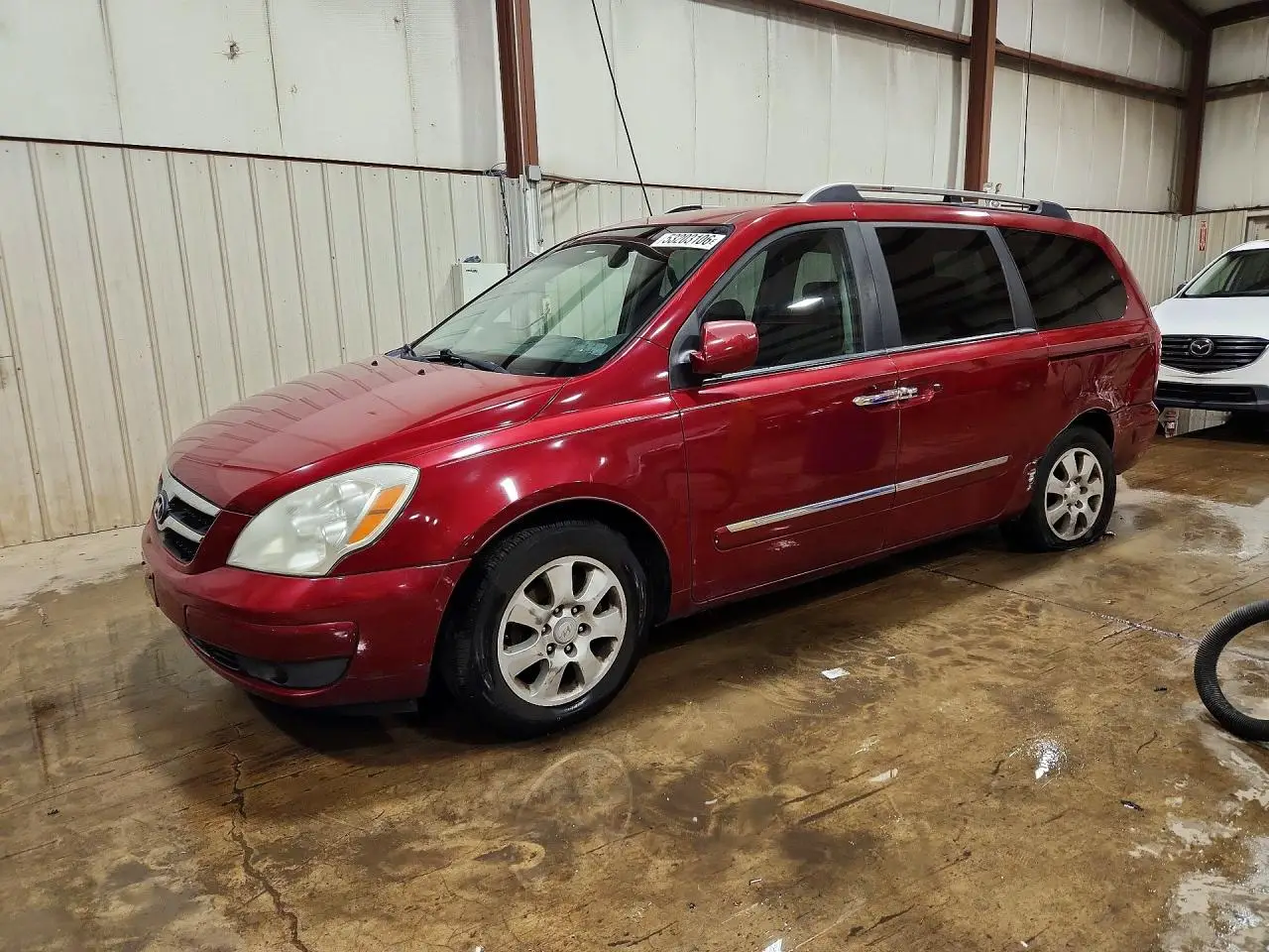 2007 HYUNDAI ENTOURAGE MAROON VIN: KNDMC233776024071